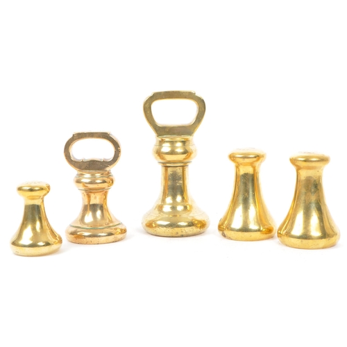 Avery - A set of five solid brass bell-shaped weights by Avery