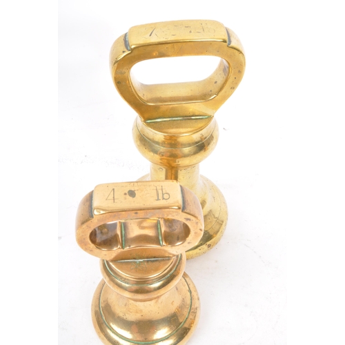 222 - Avery - A set of five solid brass bell-shaped weights by Avery. Lot to include 2lb, three x 4lb and ... 