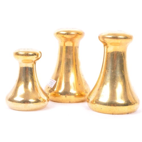 222 - Avery - A set of five solid brass bell-shaped weights by Avery. Lot to include 2lb, three x 4lb and ... 