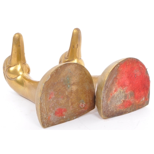 244 - A vintage 20th century brass bookends in the form of duck heads / busts. Measures approx. 16cm tall.