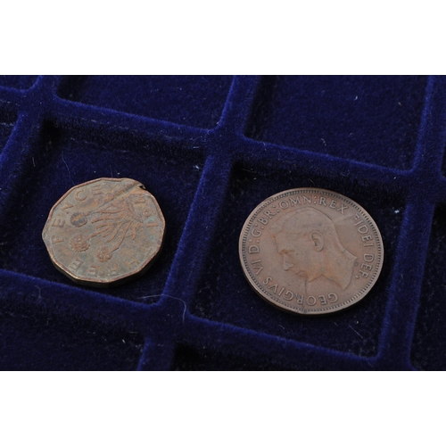 499 - A collection of mid 20th century uncirculated pre decimalisation UK coin currency. Most threepence p... 