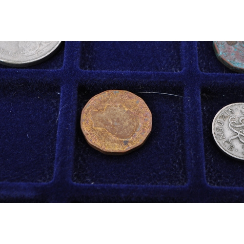 499 - A collection of mid 20th century uncirculated pre decimalisation UK coin currency. Most threepence p... 