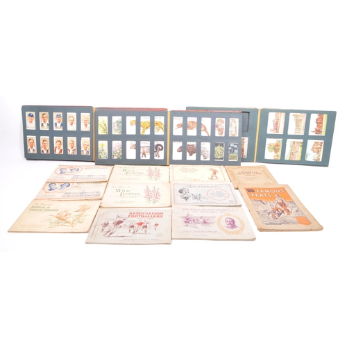 502 - A collection of vintage 20th century Wills's cigarette cards. Including, Our King and Queen, Wild Fl... 