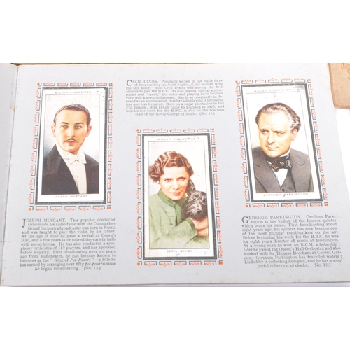 502 - A collection of vintage 20th century Wills's cigarette cards. Including, Our King and Queen, Wild Fl... 