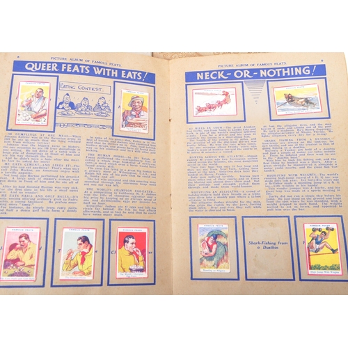 502 - A collection of vintage 20th century Wills's cigarette cards. Including, Our King and Queen, Wild Fl... 