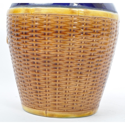 63 - George Jones - A 19th century George Jones majolica pottery 'Basket' jug. The basket having cobalt g... 