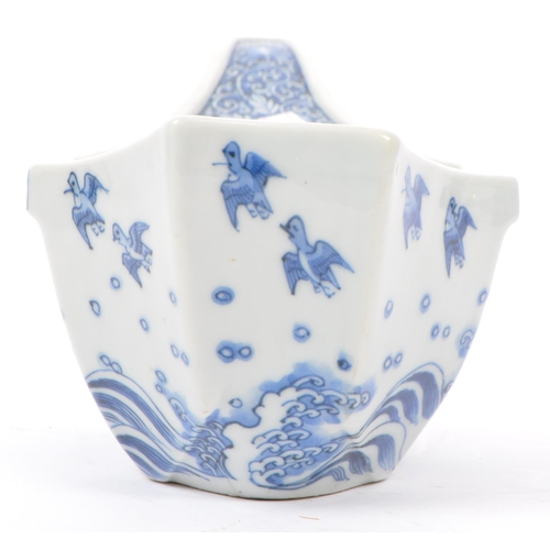 65 - An early 20th century Japanese Taisho period blue and white porcelain hand painted boat bowl of irre... 