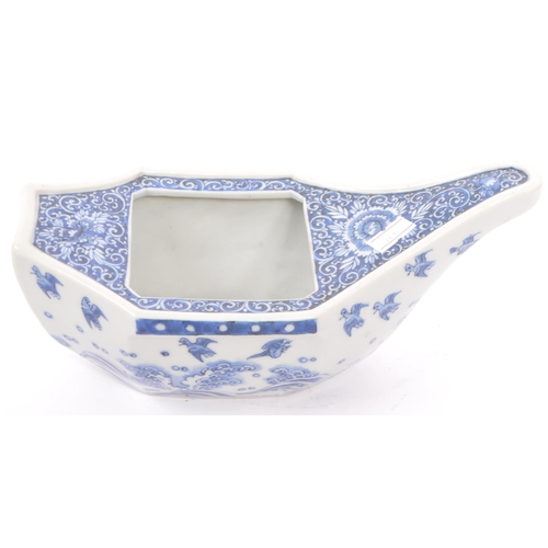 65 - An early 20th century Japanese Taisho period blue and white porcelain hand painted boat bowl of irre... 