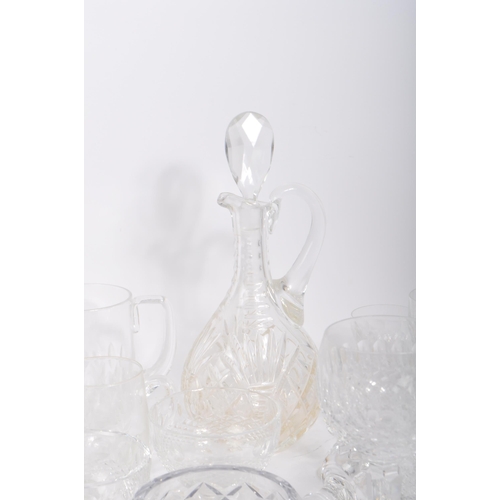 76 - A large collection of 19th century and later cut glass to include Waterford crystal. The lot to incl... 