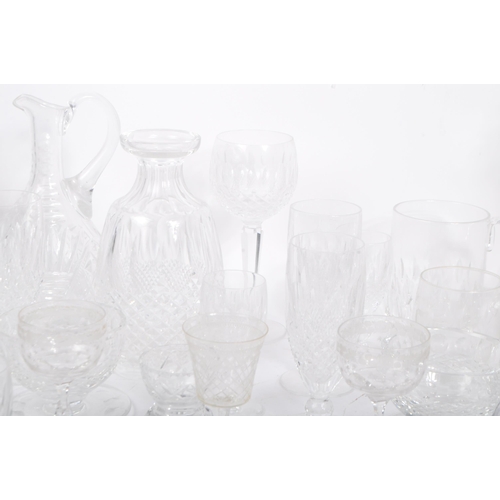 76 - A large collection of 19th century and later cut glass to include Waterford crystal. The lot to incl... 