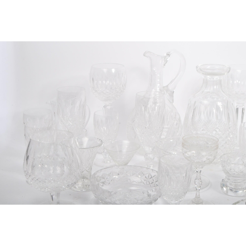 76 - A large collection of 19th century and later cut glass to include Waterford crystal. The lot to incl... 