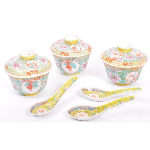 77 - A collection of vintage 20th century Chinese Asian rice bowls with lids and spoons. In the Famille r... 