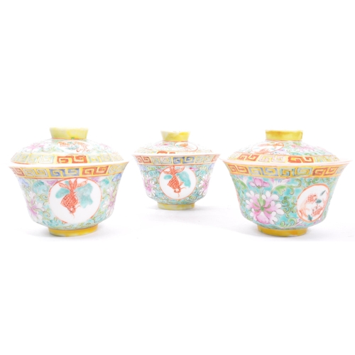 77 - A collection of vintage 20th century Chinese Asian rice bowls with lids and spoons. In the Famille r... 