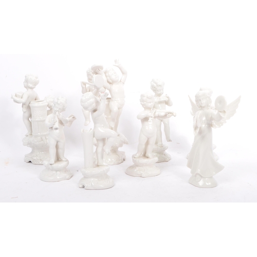 81 - A collection of 20th century Italian porcelain Bassano blanc de chine band figures and stem / spill ... 