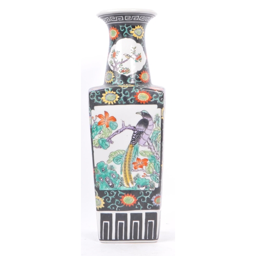 85 - A mid century 1950s Hong Kong / Chinese ceramic decorative vase. Having a scalloped flared rim with ... 