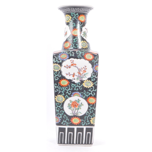85 - A mid century 1950s Hong Kong / Chinese ceramic decorative vase. Having a scalloped flared rim with ... 