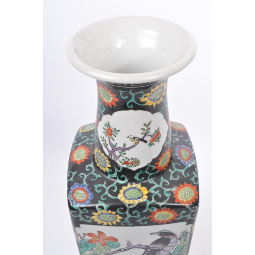 85 - A mid century 1950s Hong Kong / Chinese ceramic decorative vase. Having a scalloped flared rim with ... 
