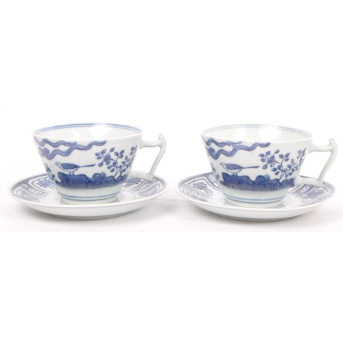 88 - An early 20th century Chinese porcelain two person tea service comprising of teacups, saucers and su... 