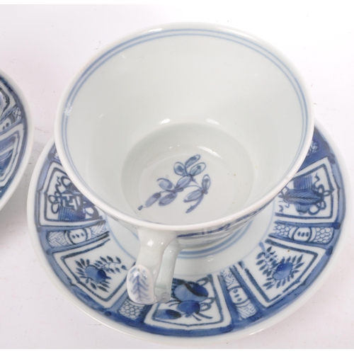 88 - An early 20th century Chinese porcelain two person tea service comprising of teacups, saucers and su... 