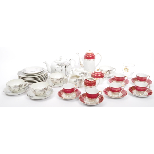90 - A set of two vintage 20th century Asian Japanese tea services sets. Comprising of teapot, cups, sauc... 