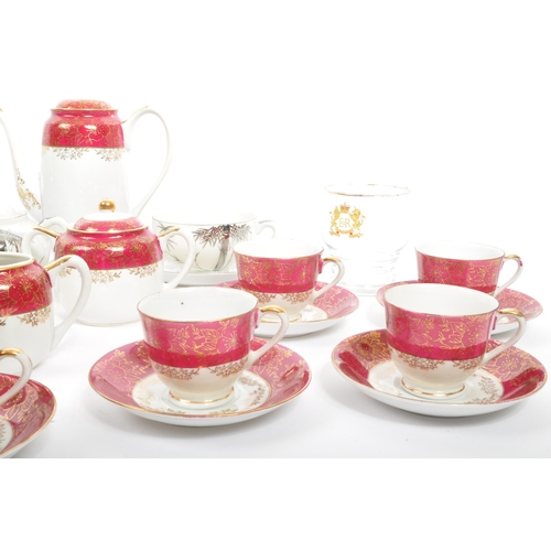 90 - A set of two vintage 20th century Asian Japanese tea services sets. Comprising of teapot, cups, sauc... 