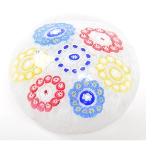 97 - Baccarat - A 20th century circa 1970s French Baccarat glass paperweight. The paperweight having mill... 