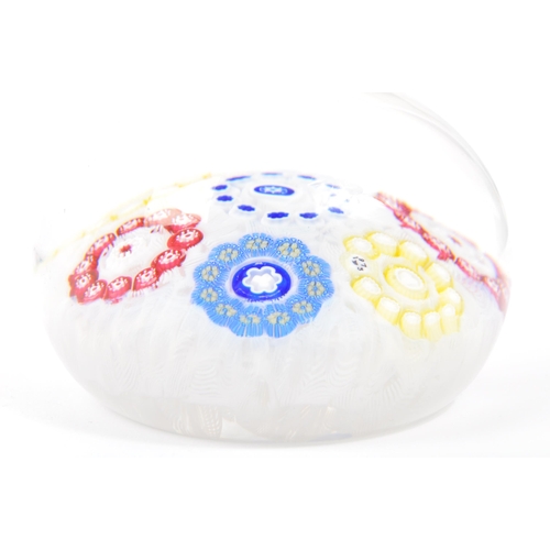 97 - Baccarat - A 20th century circa 1970s French Baccarat glass paperweight. The paperweight having mill... 