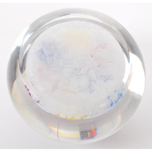 97 - Baccarat - A 20th century circa 1970s French Baccarat glass paperweight. The paperweight having mill... 