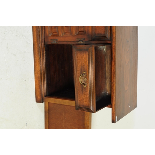 1055 - Younger - A mid century circa 1970s Younger Toledo oak sideboard credenza. The sideboard having cham... 