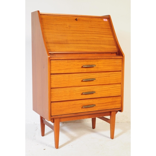 610 - British Modern Design - A mid 20th century teak bureau in the manner of Jentique furniture. The bure... 
