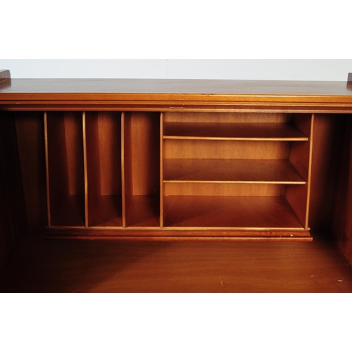 610 - British Modern Design - A mid 20th century teak bureau in the manner of Jentique furniture. The bure... 