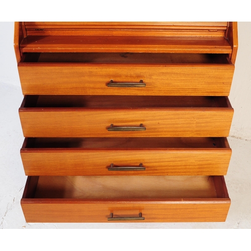 610 - British Modern Design - A mid 20th century teak bureau in the manner of Jentique furniture. The bure... 