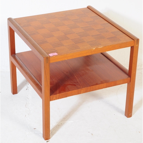 611 - McIntosh Furniture - A mid 20th century teak chequered side table. The table having check board type... 