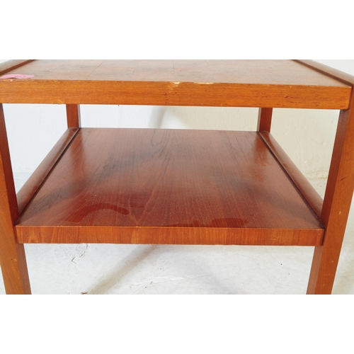 611 - McIntosh Furniture - A mid 20th century teak chequered side table. The table having check board type... 