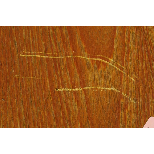 613 - G Plan - A mid 20th century G-Plan teak extending dining table and chairs. The table being of circul... 