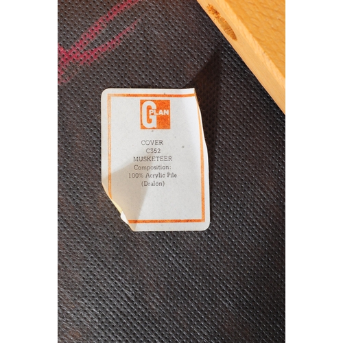 613 - G Plan - A mid 20th century G-Plan teak extending dining table and chairs. The table being of circul... 