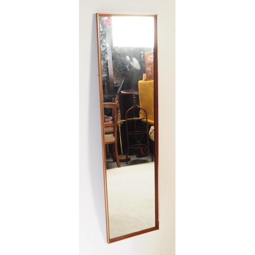 616 - British Modern Design - A mid century teak and flash worked gilt metal rectangular wall mirror. Cent... 