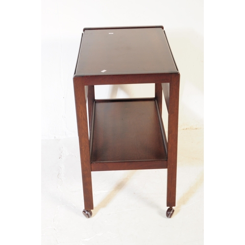 617 - BRITISH MODERN DESIGN - A mid century teak wood butlers hostess serving trolley. Drop leaves to the ... 