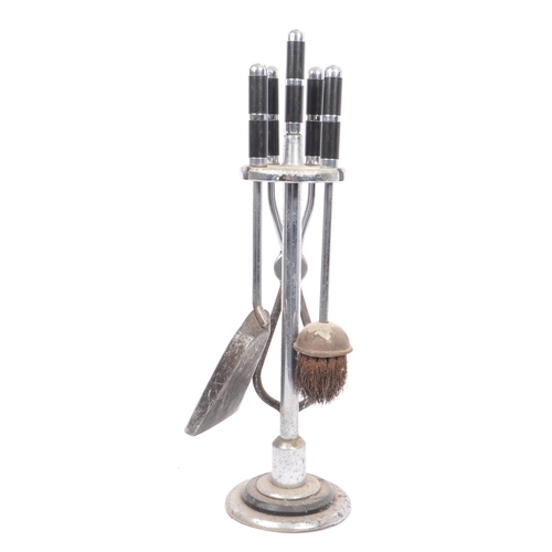 618 - A 1930's Art Deco chrome fireside suite / companion set comprising of hearth brush, fire poker, tong... 