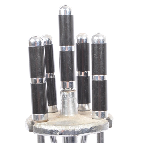 618 - A 1930's Art Deco chrome fireside suite / companion set comprising of hearth brush, fire poker, tong... 