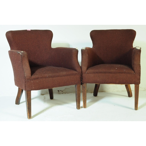 619 - British Modern Design - A pair of mid century woollen upholstered armchairs. The chairs being raised... 