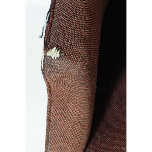 619 - British Modern Design - A pair of mid century woollen upholstered armchairs. The chairs being raised... 