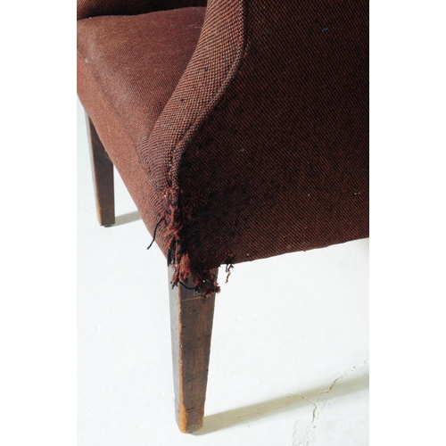 619 - British Modern Design - A pair of mid century woollen upholstered armchairs. The chairs being raised... 