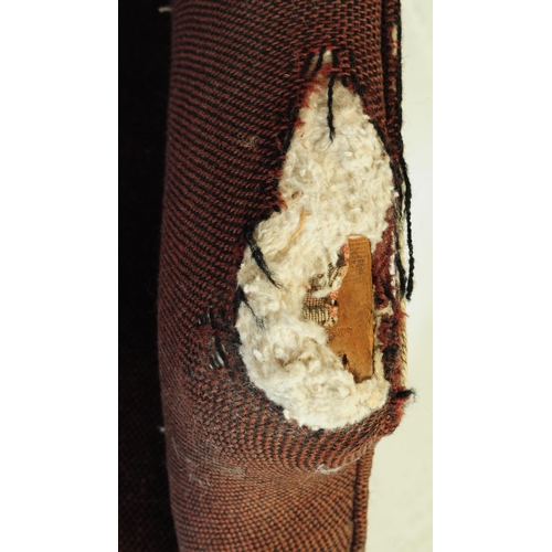 619 - British Modern Design - A pair of mid century woollen upholstered armchairs. The chairs being raised... 