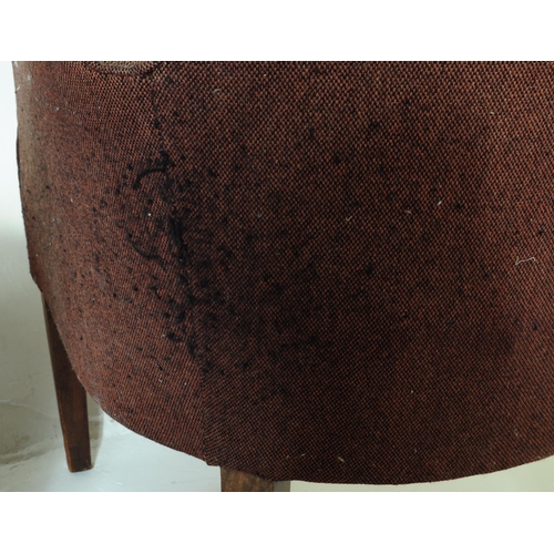 619 - British Modern Design - A pair of mid century woollen upholstered armchairs. The chairs being raised... 