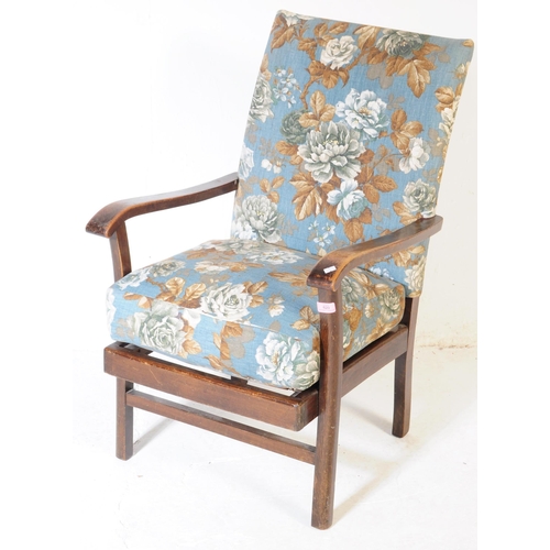 620 - A 1940s bentwood Art Deco fireside armchair. Raised on squared legs with chintz upholstered seat and... 