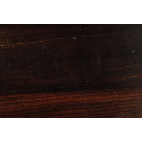 622 - A vintage 20th century teak wood nest of tables. Of rectangular form with upright square supports un... 