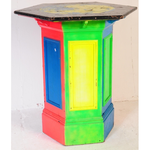 623 - A vintage 20th century UV painted occasional beer / café garden table. Of hexagonal shape with large... 
