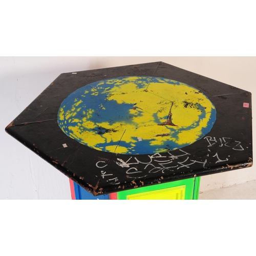 623 - A vintage 20th century UV painted occasional beer / café garden table. Of hexagonal shape with large... 