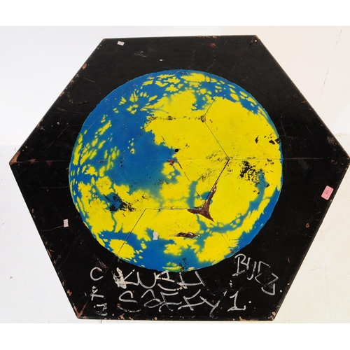 623 - A vintage 20th century UV painted occasional beer / café garden table. Of hexagonal shape with large... 